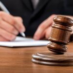 Gavel on a table symbolising legal compliance in South Africa’s HSE regulations.