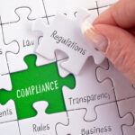 Puzzle pieces representing workplace compliance, including safety, quality, environmental, and legal elements, with the final piece labeled ‘Regulations’ being placed.